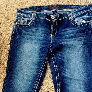 Used cropped jeans w designed pockets; low waisted